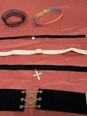 6 Pretty Chokers. 4 Black, 1 Pink And One Multicolored.